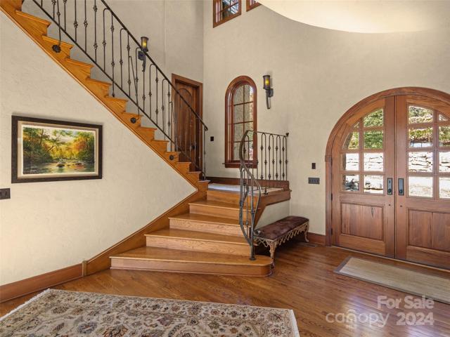Looking from foyer, back to stairwell, and to left of the window, is access to the office.