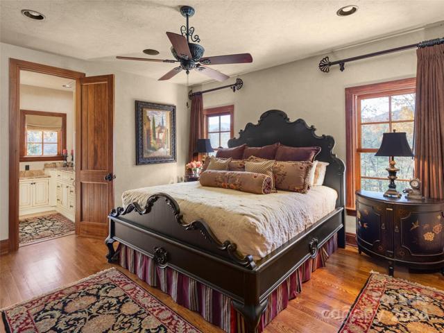 Upstairs bedroom- see mountains through the bedroom windows