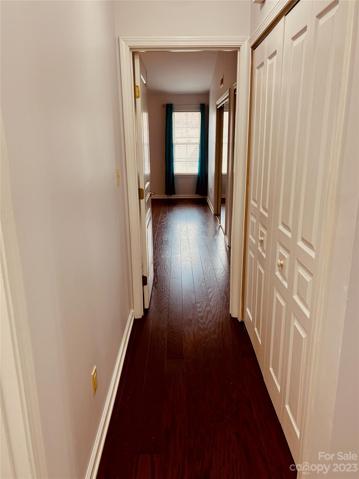 The bedroom and laundry hallway