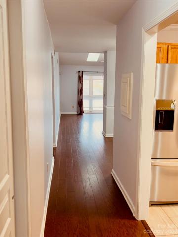 Your entry hallway, closet left, kitchen right