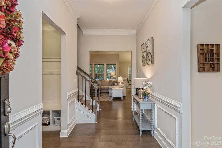 Foyer with wide plank laminate floor