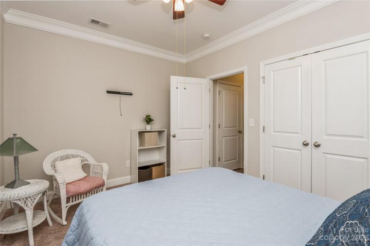 3rd bedroom with plush carpet