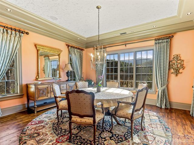 Back inside, your formal dining room is the epitome of gracious dining - with views!