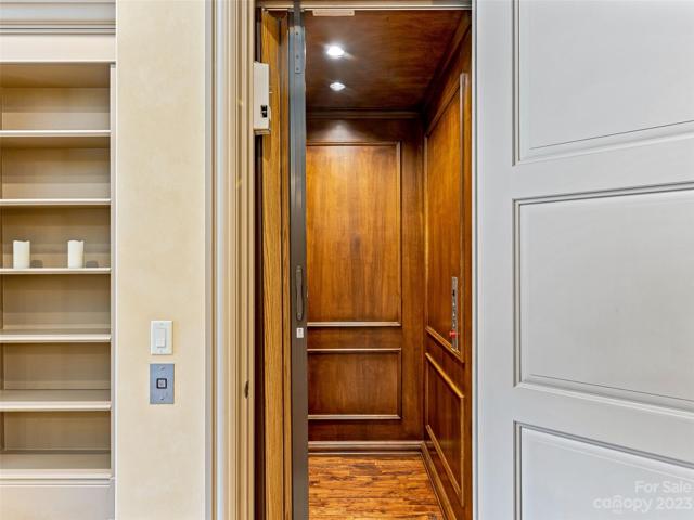 A beautifully paneled (and convenient for aging in place) elevator!