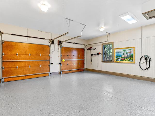 An immaculate work of art (pun intended) two-car garage!