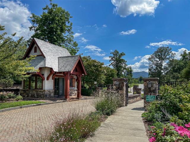 In the North Asheville highly sought-after, private, gated community of Thoms Estate