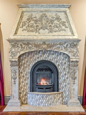 Old world charm abounds in this hand carved masterpiece