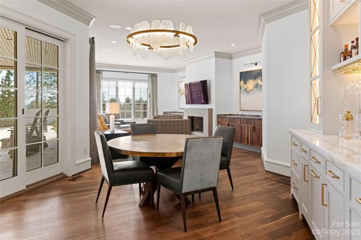 The kitchen seamlessly flows into the dining area and the keeping room as well as the covered outdoor patio
