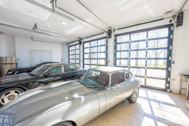 The 3 car garage also feature a back access garage door