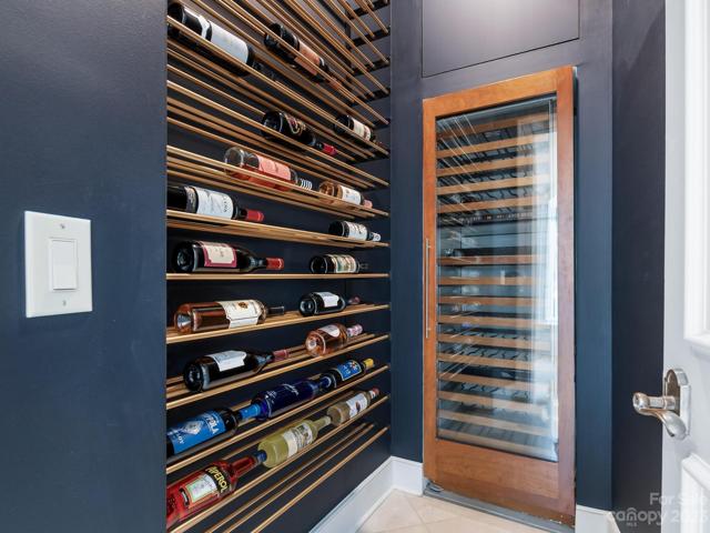 The wine closet located adjacent to the bar