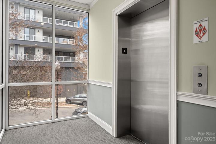 Elevator access from parking and street levels.
