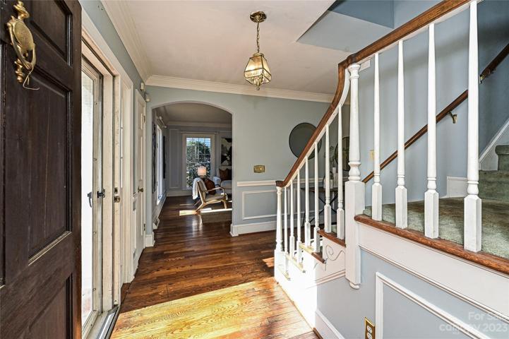 Entrance foyer with hardwood floors on main level