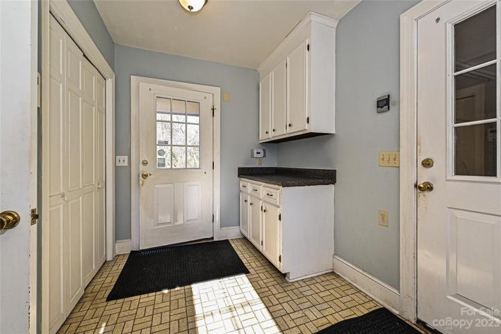 Mud room exit to garage and rear deck