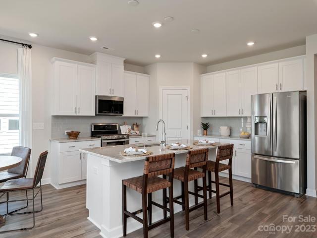 Photo is not of the actual home, but is an inspirational photo of builder’s model home and may depict options, furnishings, and/or decorator features that are not included