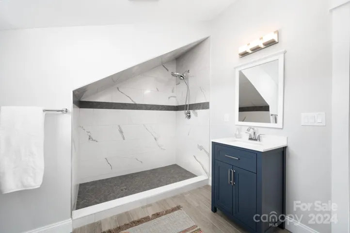 4th Full bathroom above the Garage