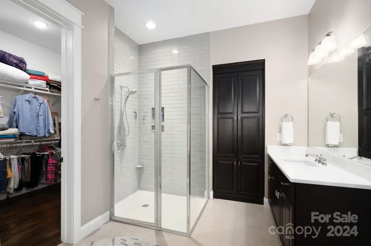 Primary Suite with Ensuite Bathroom and Walk-in Closet