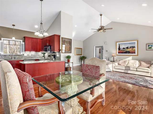 Light, bright and open, Easy Living!- Primary and laundry on one side (*behind in this picture) and the other 2 bedrooms and bathroom are across the home, where you can see the hallway here.