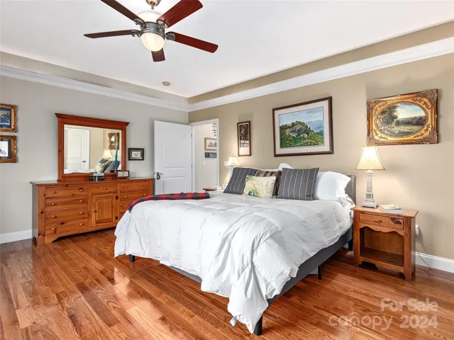 Primary bedroom with a great deal of space for your reading area, walk in closet, and spacious bathroom!