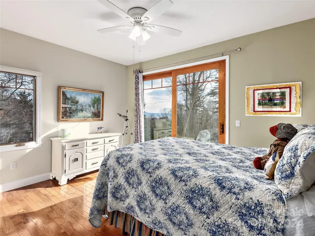 2nd bedroom - with mountain views and walk out onto the deck to soak up the sun!