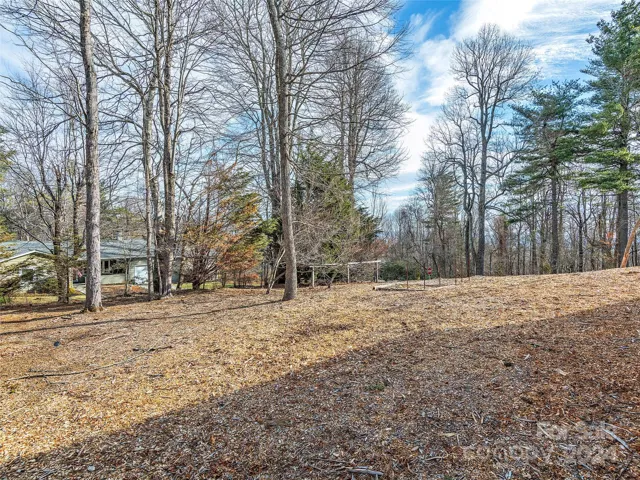 Front sidewalk to the left of the driveway when you pull in - to enter this well maintained gem!