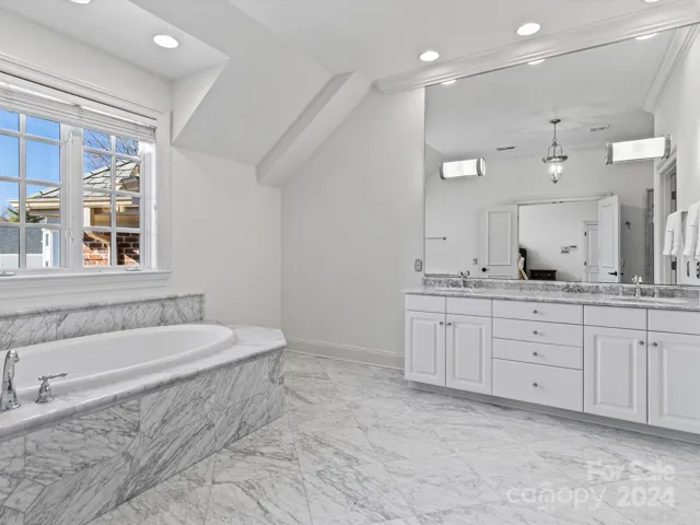 (2) Primary Suite Marble Tub and Vanity