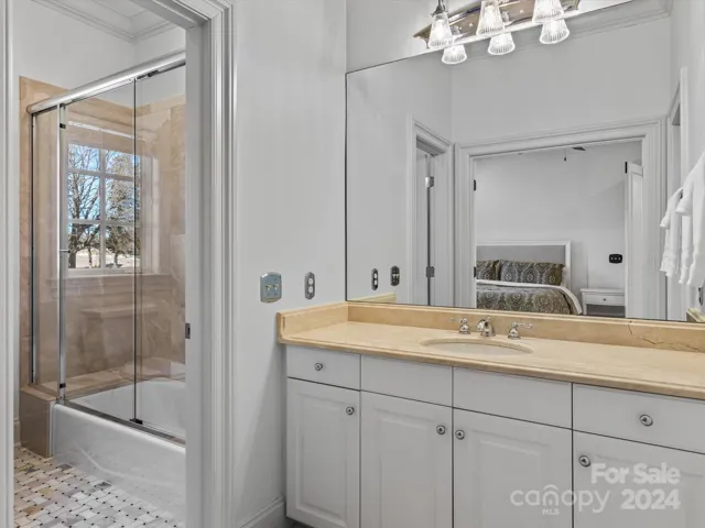 (1) Marble surround, tub/shower combo, Marble top vanity