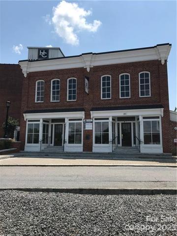 Sample of building allowed. Commercial down and residential on upper floor