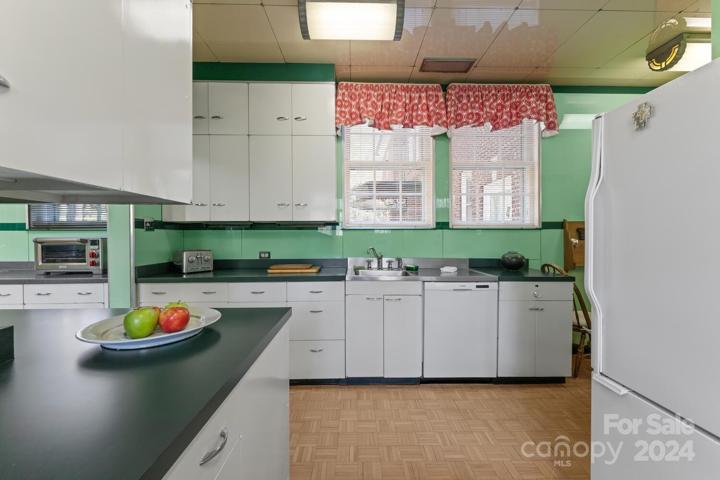 Kitchen with Vitrolite Glass Wall & Ceiling Tiles