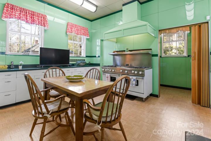 Kitchen with Vitrolite Glass Wall & Ceiling Tiles