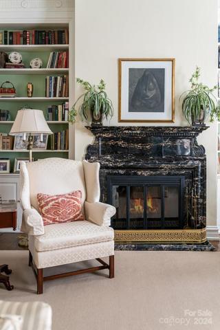 Living Room with Built Ins and Fireplace