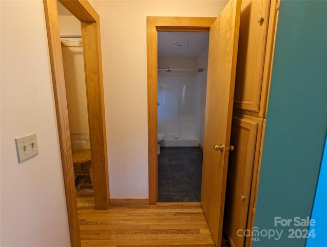 Entrance to primary closet and primary bathroom ensuite