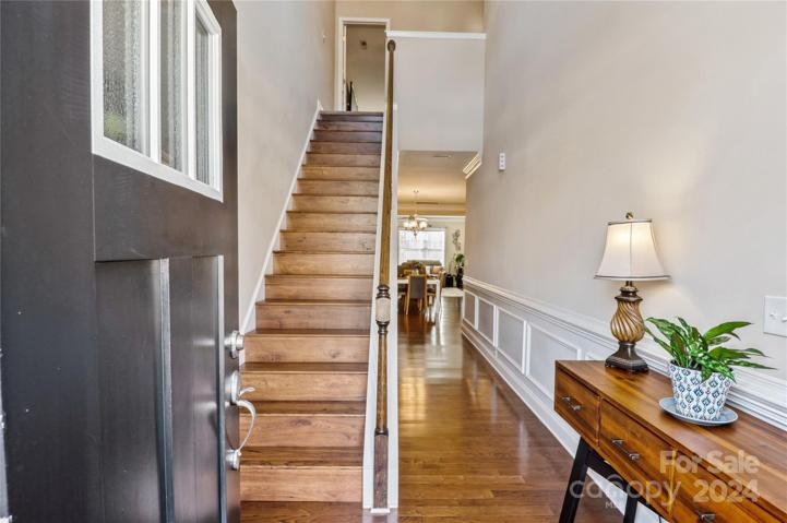Foyer & Hallway with gleaming hardwoods