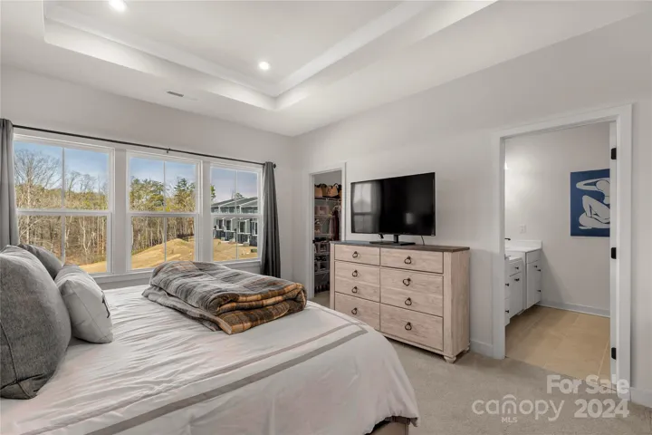 Primary bedroom with Pond view