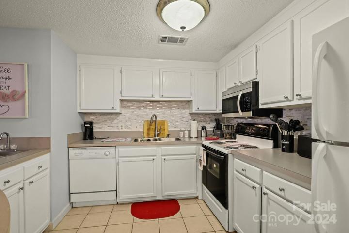 Bright kitchen with appliances included
