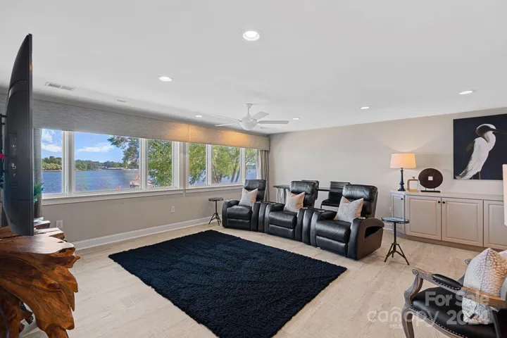 Upstairs movie loft/media room, perfect to cozy up and watch movies with a water view!