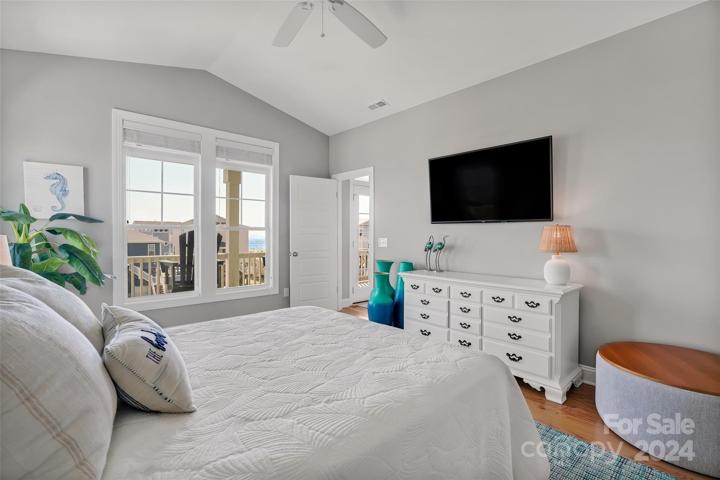 Primary Bedroom with vaulted ceilings