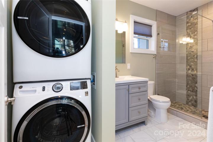 Bathroom with washer and dryer, guest quarters in main house
