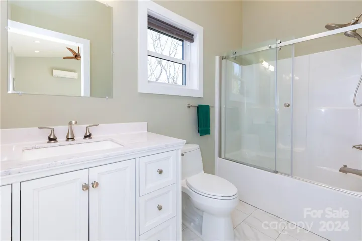 Upstairs bathroom off of loft bedroom/office in main house