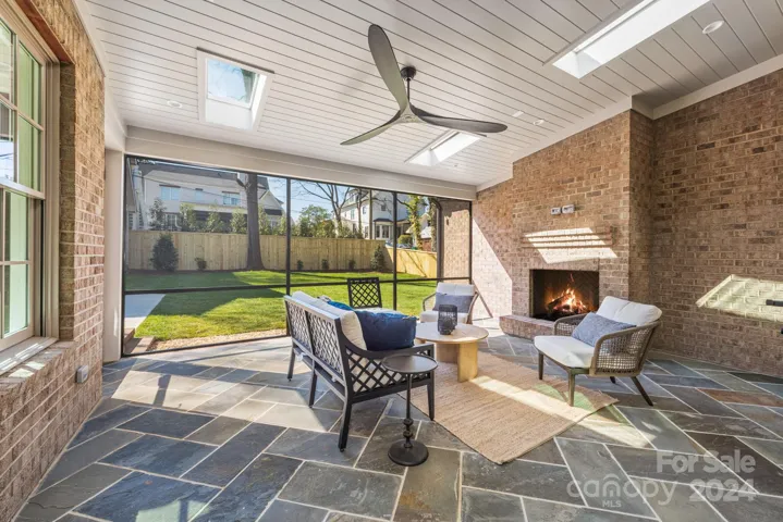 Screened porch overlooking the flat yard