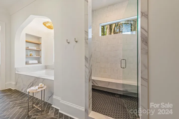 Oversized soaking tub and large shower in the Primary Bath