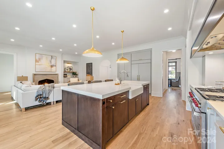 Kitchen with Subzero refrigerator, Wolf Dual Fuel range, custom cabinets 
