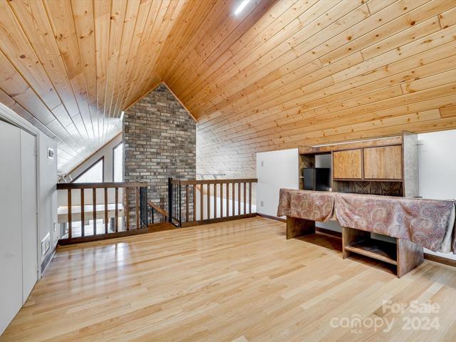 Stunning view from the loft to Great Room, elevator to the left of the fireplace.