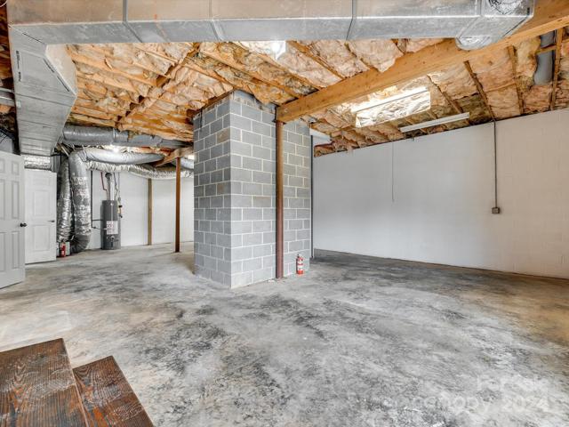 Nearly 1500 SqFT of potential in this unfinished basement! There's also a 1/2 bath in place.