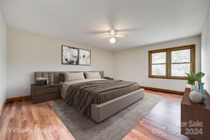 Primary suite on main, split bedroom plan-virtually staged