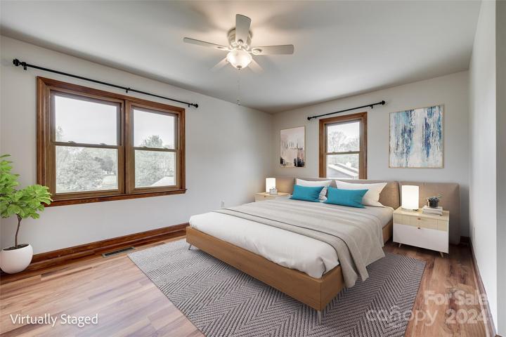Secondary bedrooms are spacious, virtually staged.