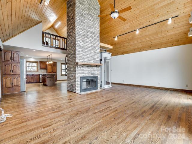 Abundant natural lighting, open floor plan, the wood-burning fireplace conveys as is with no known issues.