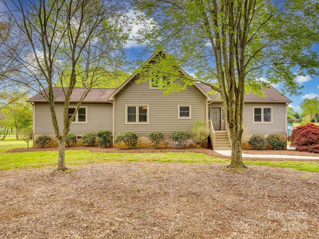 Location, location! 3BR/2.5BA basement home on 1.07 acres-new concrete driveway/sidewalk!
