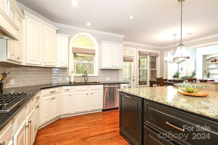Kitchen--wood floors and Granite