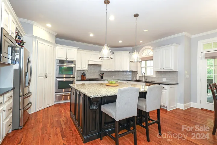 Kitchen-wood floors and Granite