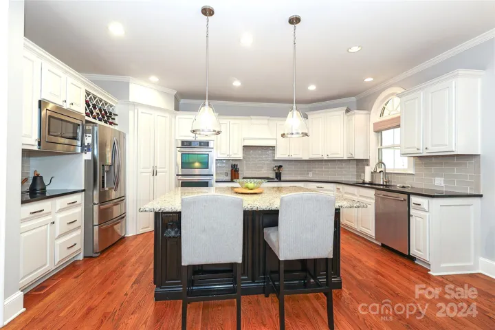 Kitchen-wood floors and Granite